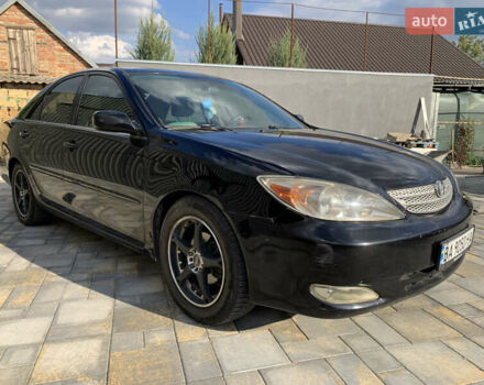 Чорний Тойота Камрі, об'ємом двигуна 2.37 л та пробігом 170 тис. км за 4300 $, фото 3 на Automoto.ua