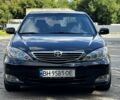 Черный Тойота Камри, объемом двигателя 3 л и пробегом 330 тыс. км за 5800 $, фото 1 на Automoto.ua