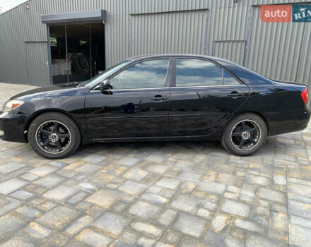 Чорний Тойота Камрі, об'ємом двигуна 2.37 л та пробігом 170 тис. км за 4300 $, фото 7 на Automoto.ua