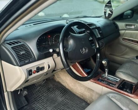 Чорний Тойота Камрі, об'ємом двигуна 3 л та пробігом 330 тис. км за 4400 $, фото 6 на Automoto.ua