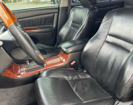 Черный Тойота Камри, объемом двигателя 2.4 л и пробегом 225 тыс. км за 7500 $, фото 11 на Automoto.ua
