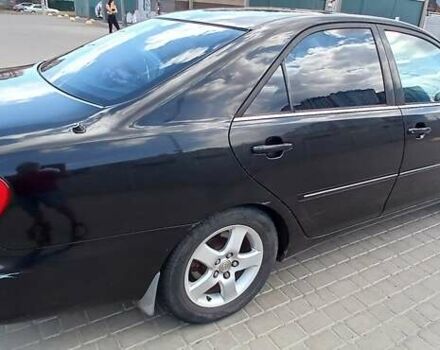 Чорний Тойота Камрі, об'ємом двигуна 2.4 л та пробігом 300 тис. км за 5200 $, фото 4 на Automoto.ua