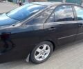 Чорний Тойота Камрі, об'ємом двигуна 2.4 л та пробігом 300 тис. км за 5200 $, фото 4 на Automoto.ua