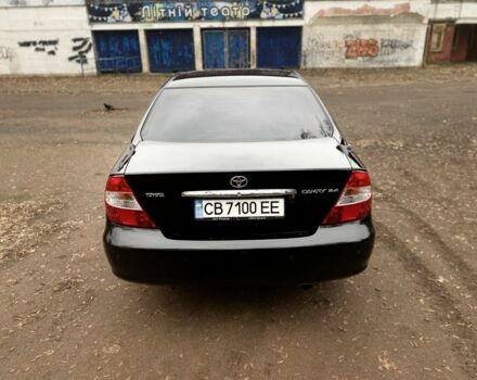 Чорний Тойота Камрі, об'ємом двигуна 2.4 л та пробігом 201 тис. км за 6999 $, фото 7 на Automoto.ua