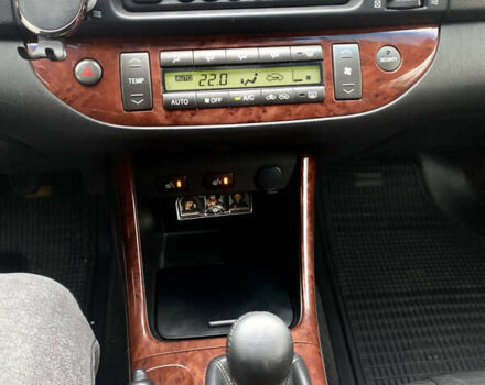 Чорний Тойота Камрі, об'ємом двигуна 2.4 л та пробігом 201 тис. км за 6999 $, фото 27 на Automoto.ua