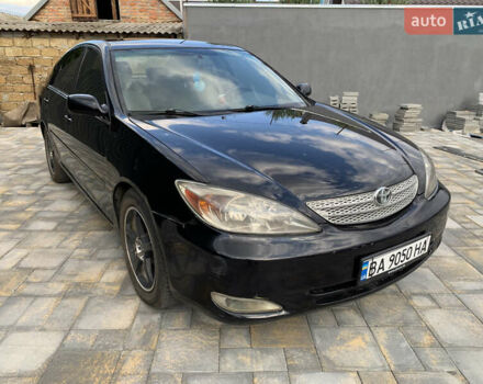 Чорний Тойота Камрі, об'ємом двигуна 2.37 л та пробігом 170 тис. км за 4300 $, фото 1 на Automoto.ua