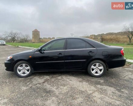 Черный Тойота Камри, объемом двигателя 3 л и пробегом 325 тыс. км за 6000 $, фото 3 на Automoto.ua