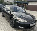 Чорний Тойота Камрі, об'ємом двигуна 2.4 л та пробігом 320 тис. км за 5500 $, фото 21 на Automoto.ua