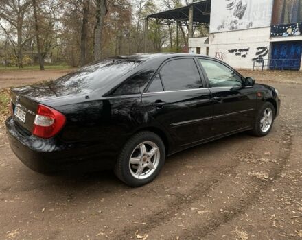 Чорний Тойота Камрі, об'ємом двигуна 2.4 л та пробігом 201 тис. км за 6999 $, фото 5 на Automoto.ua