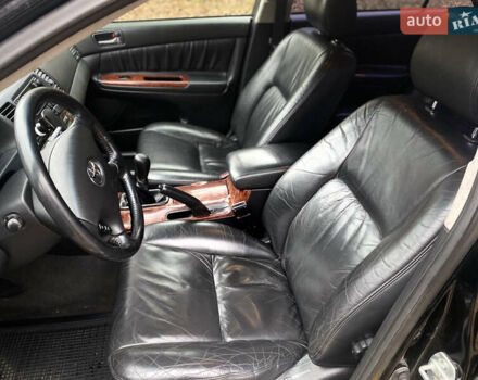 Чорний Тойота Камрі, об'ємом двигуна 2.4 л та пробігом 201 тис. км за 6999 $, фото 18 на Automoto.ua