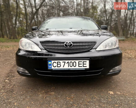 Чорний Тойота Камрі, об'ємом двигуна 2.4 л та пробігом 201 тис. км за 6999 $, фото 2 на Automoto.ua