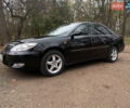Чорний Тойота Камрі, об'ємом двигуна 2.4 л та пробігом 201 тис. км за 6999 $, фото 1 на Automoto.ua