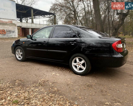 Чорний Тойота Камрі, об'ємом двигуна 2.4 л та пробігом 201 тис. км за 6999 $, фото 12 на Automoto.ua