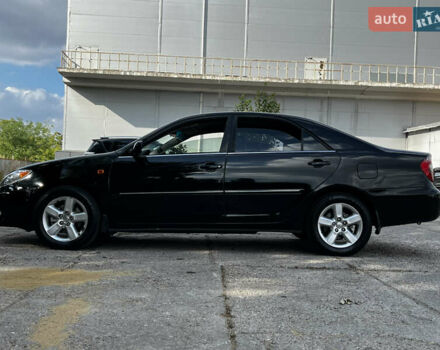 Черный Тойота Камри, объемом двигателя 3 л и пробегом 320 тыс. км за 5100 $, фото 3 на Automoto.ua