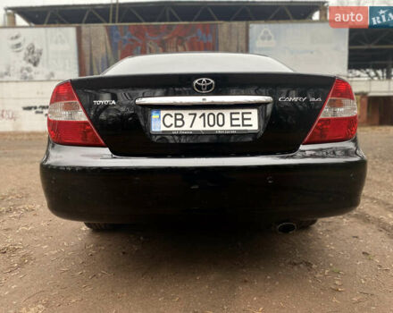 Чорний Тойота Камрі, об'ємом двигуна 2.4 л та пробігом 201 тис. км за 6999 $, фото 9 на Automoto.ua