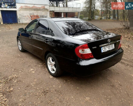 Чорний Тойота Камрі, об'ємом двигуна 2.4 л та пробігом 201 тис. км за 6999 $, фото 11 на Automoto.ua