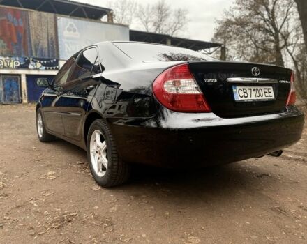 Чорний Тойота Камрі, об'ємом двигуна 2.4 л та пробігом 201 тис. км за 6999 $, фото 9 на Automoto.ua