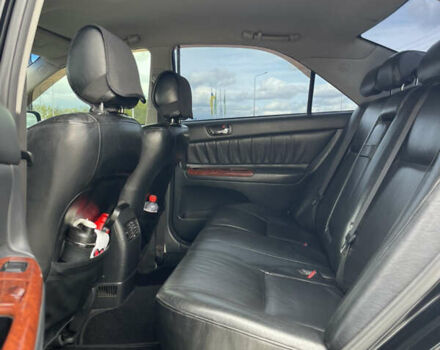Черный Тойота Камри, объемом двигателя 2.4 л и пробегом 225 тыс. км за 7500 $, фото 15 на Automoto.ua