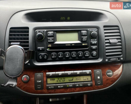 Чорний Тойота Камрі, об'ємом двигуна 2.4 л та пробігом 201 тис. км за 6999 $, фото 26 на Automoto.ua