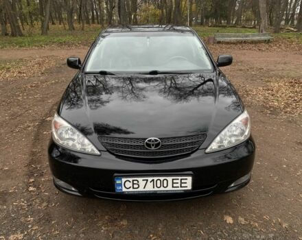 Чорний Тойота Камрі, об'ємом двигуна 2.4 л та пробігом 201 тис. км за 6999 $, фото 1 на Automoto.ua