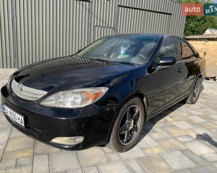 Чорний Тойота Камрі, об'ємом двигуна 2.37 л та пробігом 170 тис. км за 4300 $, фото 2 на Automoto.ua