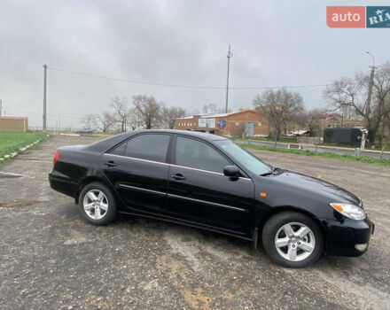 Черный Тойота Камри, объемом двигателя 3 л и пробегом 325 тыс. км за 6000 $, фото 2 на Automoto.ua