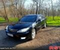 Черный Тойота Камри, объемом двигателя 3 л и пробегом 450 тыс. км за 7300 $, фото 1 на Automoto.ua