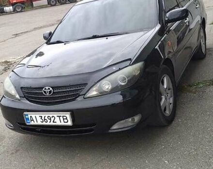 Чорний Тойота Камрі, об'ємом двигуна 2.4 л та пробігом 300 тис. км за 6500 $, фото 2 на Automoto.ua