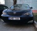 Черный Тойота Камри, объемом двигателя 2.4 л и пробегом 176 тыс. км за 1460 $, фото 1 на Automoto.ua