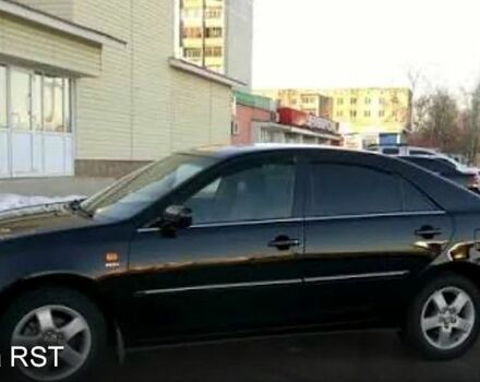 Черный Тойота Камри, объемом двигателя 2.5 л и пробегом 294 тыс. км за 7000 $, фото 1 на Automoto.ua