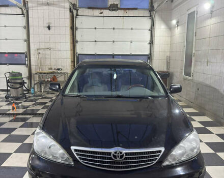 Черный Тойота Камри, объемом двигателя 2.36 л и пробегом 527 тыс. км за 5400 $, фото 2 на Automoto.ua