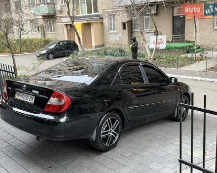 Черный Тойота Камри, объемом двигателя 2.36 л и пробегом 353 тыс. км за 6500 $, фото 13 на Automoto.ua