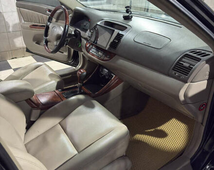 Черный Тойота Камри, объемом двигателя 2.36 л и пробегом 527 тыс. км за 5400 $, фото 12 на Automoto.ua