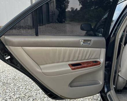 Чорний Тойота Камрі, об'ємом двигуна 2.36 л та пробігом 511 тис. км за 7600 $, фото 22 на Automoto.ua