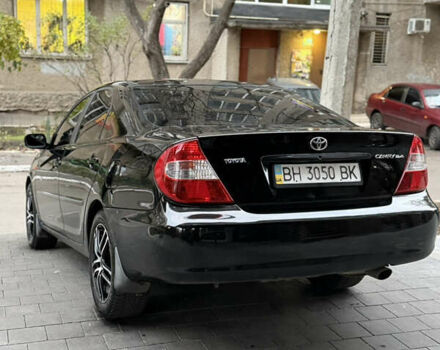 Черный Тойота Камри, объемом двигателя 2.36 л и пробегом 353 тыс. км за 6500 $, фото 9 на Automoto.ua