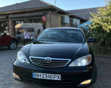 Черный Тойота Камри, объемом двигателя 2.4 л и пробегом 268 тыс. км за 5750 $, фото 7 на Automoto.ua