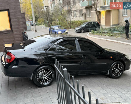 Черный Тойота Камри, объемом двигателя 2.36 л и пробегом 353 тыс. км за 6500 $, фото 14 на Automoto.ua