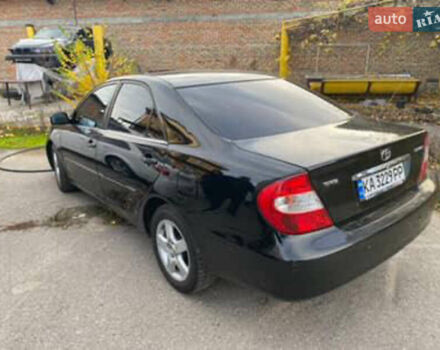 Черный Тойота Камри, объемом двигателя 2.36 л и пробегом 361 тыс. км за 3999 $, фото 2 на Automoto.ua