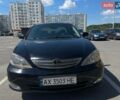 Черный Тойота Камри, объемом двигателя 2.36 л и пробегом 315 тыс. км за 6200 $, фото 1 на Automoto.ua
