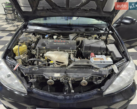 Черный Тойота Камри, объемом двигателя 2.36 л и пробегом 527 тыс. км за 5400 $, фото 9 на Automoto.ua