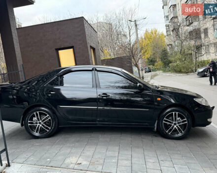 Черный Тойота Камри, объемом двигателя 2.36 л и пробегом 353 тыс. км за 6500 $, фото 15 на Automoto.ua