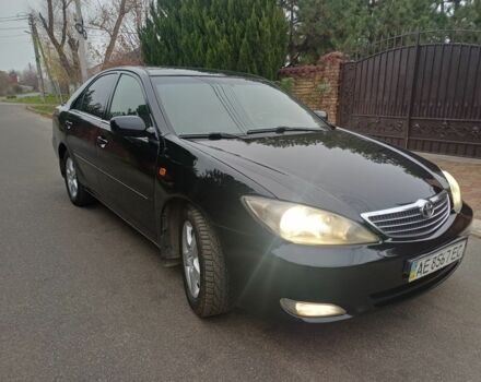 Черный Тойота Камри, объемом двигателя 2.4 л и пробегом 250 тыс. км за 5500 $, фото 2 на Automoto.ua