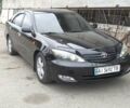 Чорний Тойота Камрі, об'ємом двигуна 2.4 л та пробігом 300 тис. км за 6500 $, фото 1 на Automoto.ua