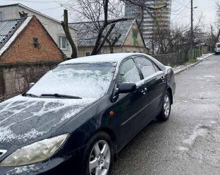 Черный Тойота Камри, объемом двигателя 2.5 л и пробегом 294 тыс. км за 7000 $, фото 2 на Automoto.ua