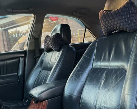Черный Тойота Камри, объемом двигателя 2.4 л и пробегом 268 тыс. км за 5750 $, фото 52 на Automoto.ua