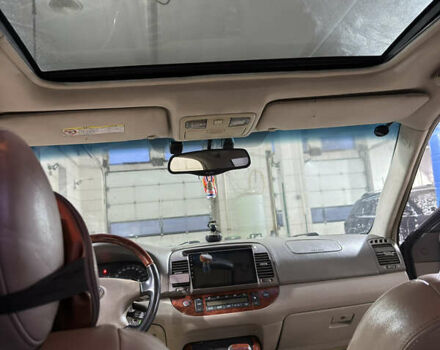 Черный Тойота Камри, объемом двигателя 2.36 л и пробегом 527 тыс. км за 5400 $, фото 24 на Automoto.ua