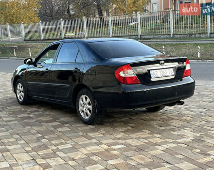 Черный Тойота Камри, объемом двигателя 2.4 л и пробегом 325 тыс. км за 4500 $, фото 6 на Automoto.ua