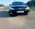 Черный Тойота Камри, объемом двигателя 2.36 л и пробегом 416 тыс. км за 5399 $, фото 1 на Automoto.ua