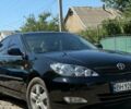 Черный Тойота Камри, объемом двигателя 3 л и пробегом 244 тыс. км за 5700 $, фото 1 на Automoto.ua