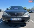 Черный Тойота Камри, объемом двигателя 2.39 л и пробегом 378 тыс. км за 5900 $, фото 1 на Automoto.ua